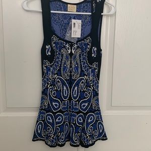 Torn by Ronny Kobo peplum top